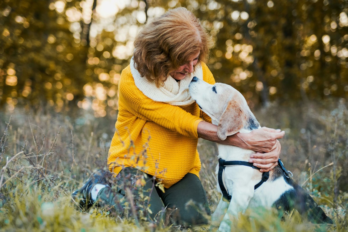 young-girl-hugging-a-cute-puppy young-girl-hugging-a-cute-puppy