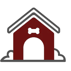 Icon of a little house with a bone decoration on it and sitting next to some bushes